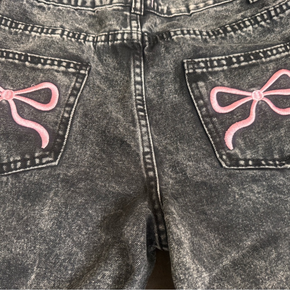 Stylish Black Boot Cut Jeans with Pink Bow Accents